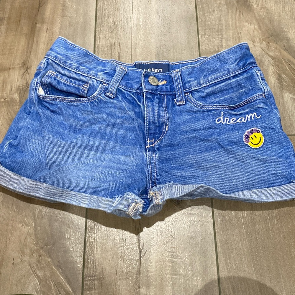 Old Navy denim shorts with patches. Size 12
